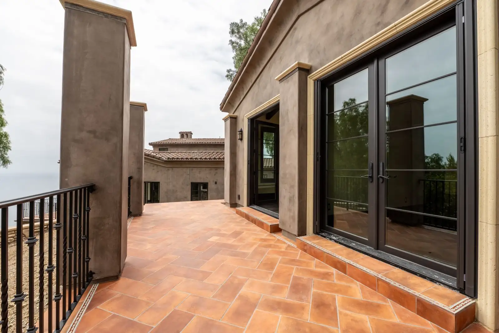 Arched wood entry door installed on a residential home in Oxnard, CA